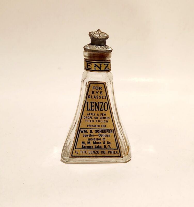 Antique bottle of LENZO eyeglass lens cleaner. Nice gilded gold label.