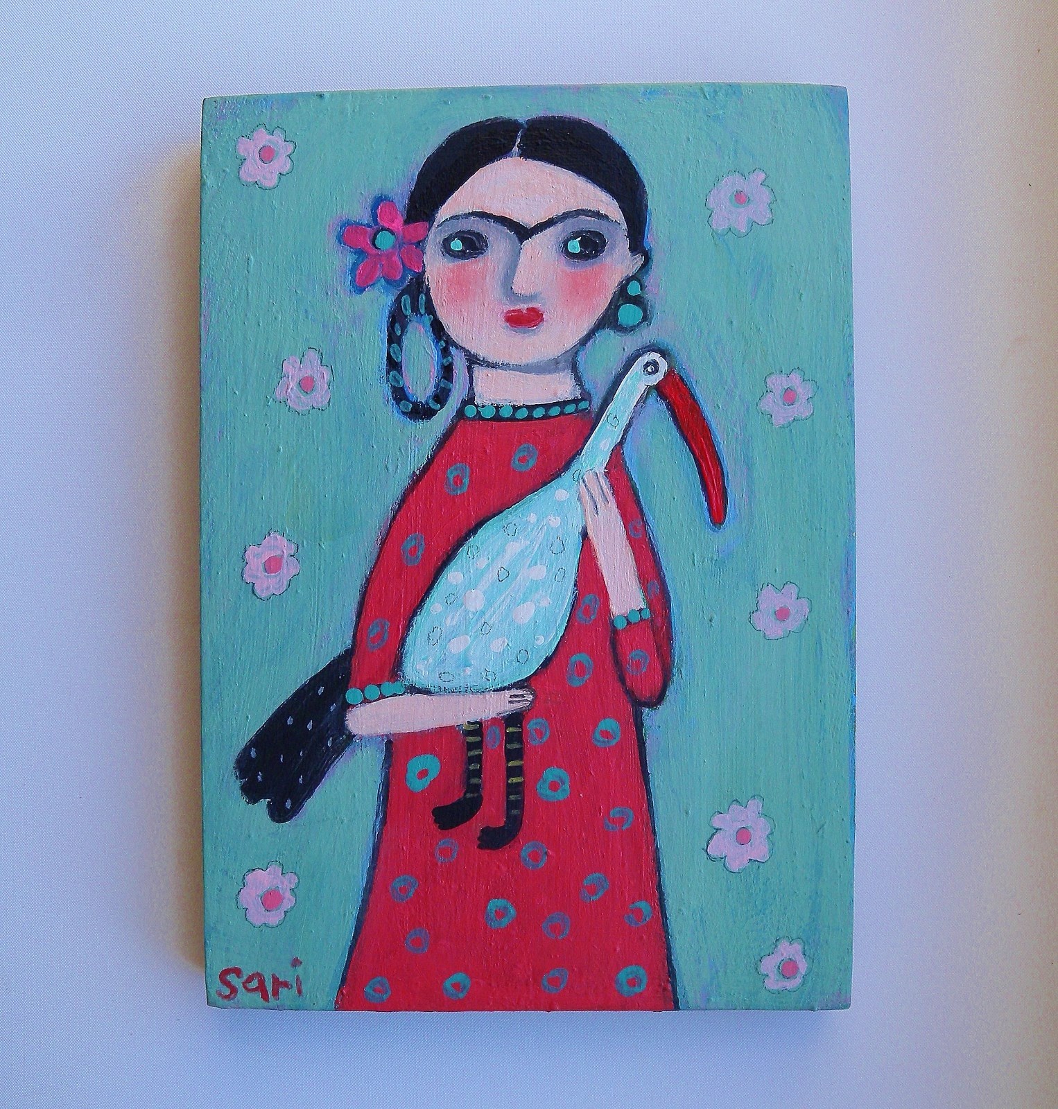 Folk Art Painting of Frida Kahlo plus Milagro Mexican Cross