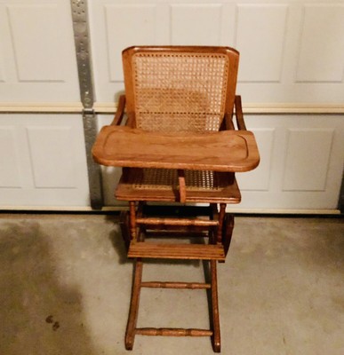 antique childs rocking chair with cane seat