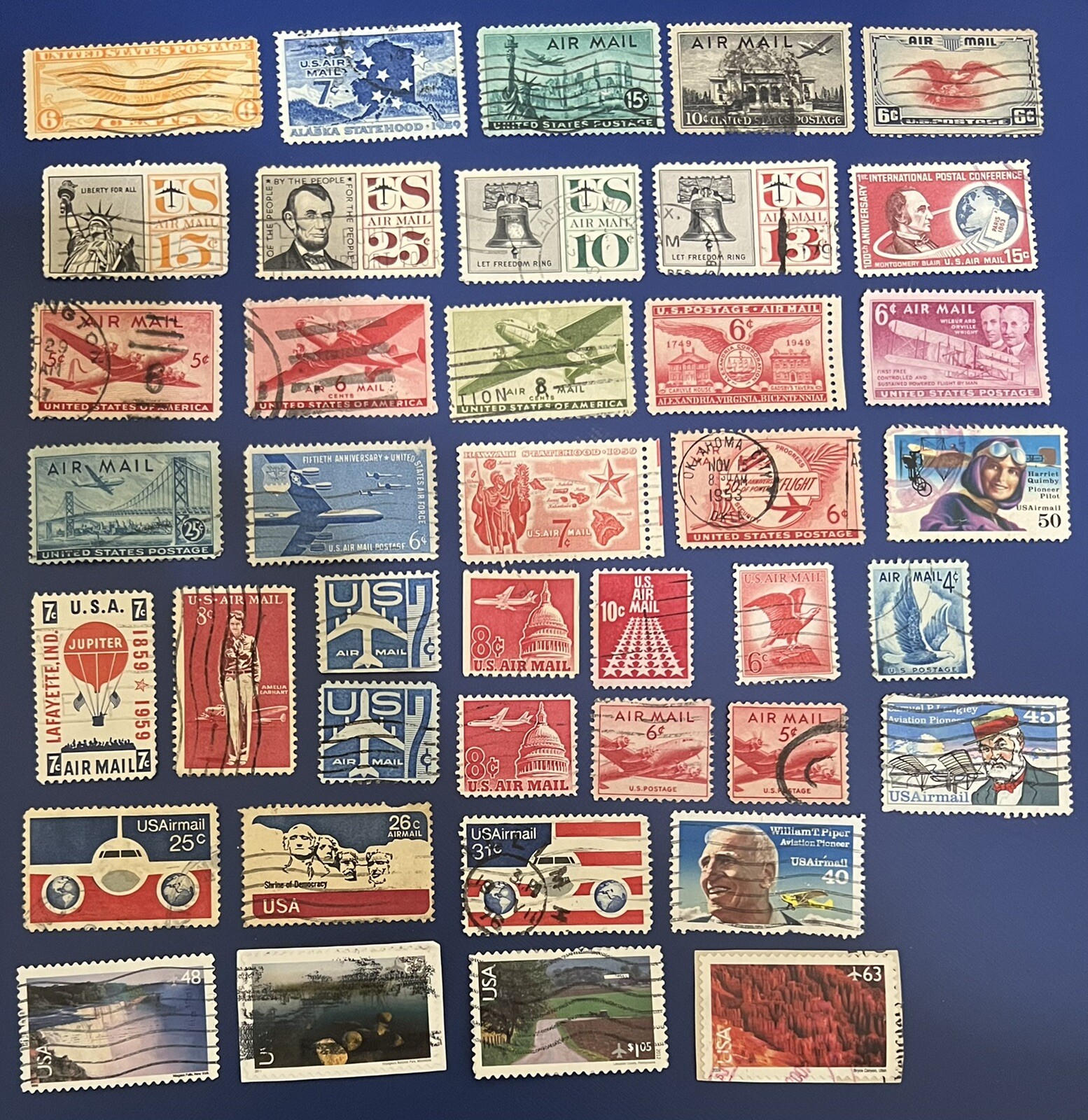 USA : Collection of 40 Airmail Stamps (used/hinged/on paper