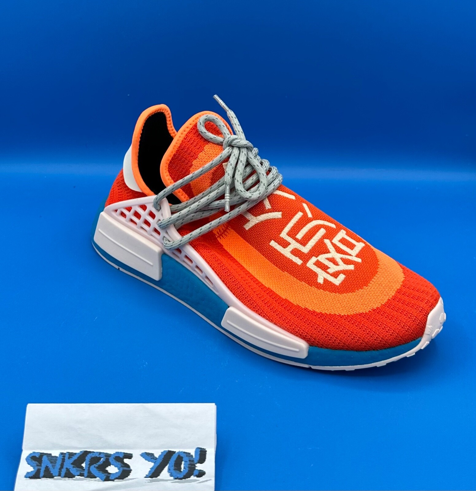 pharrell x adidas nmd hu bright orange
