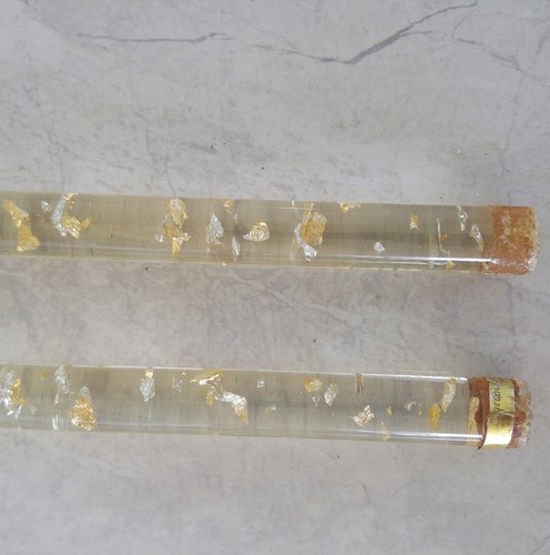 Vintage 2 lucite candlesticks silver and gold inside with sculpted metal candle