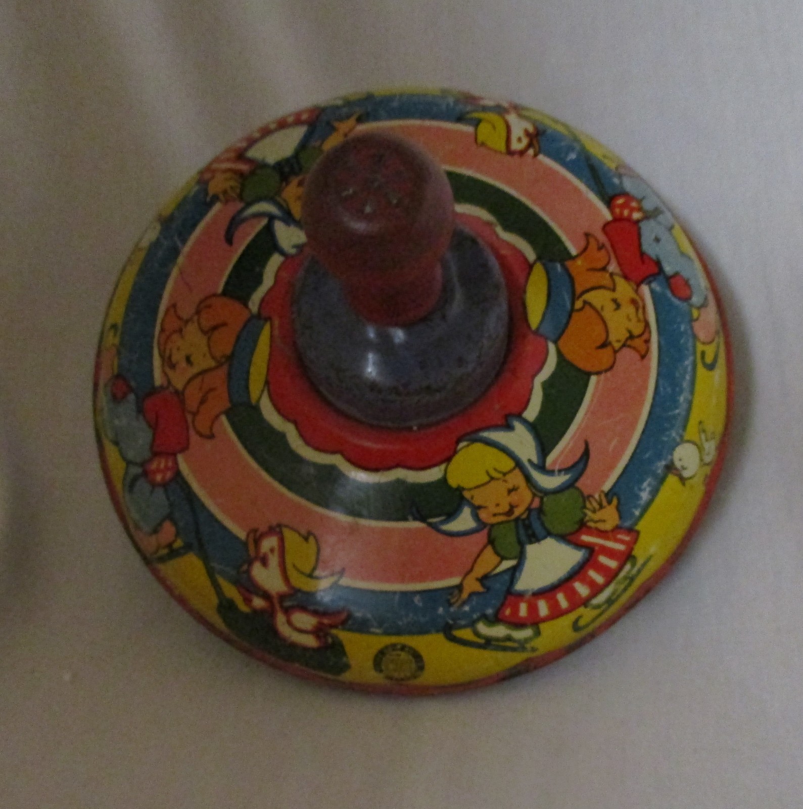 1940's Ohio Art spinning top - Dutch Girl with Animals/Pets