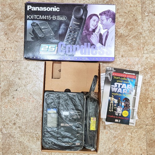 Panasonic KX-TCM415-B 900 MHz Cordless Answering System 25 Panasonic KX-TCM415-B 900 MHz Cordless Answering System 25