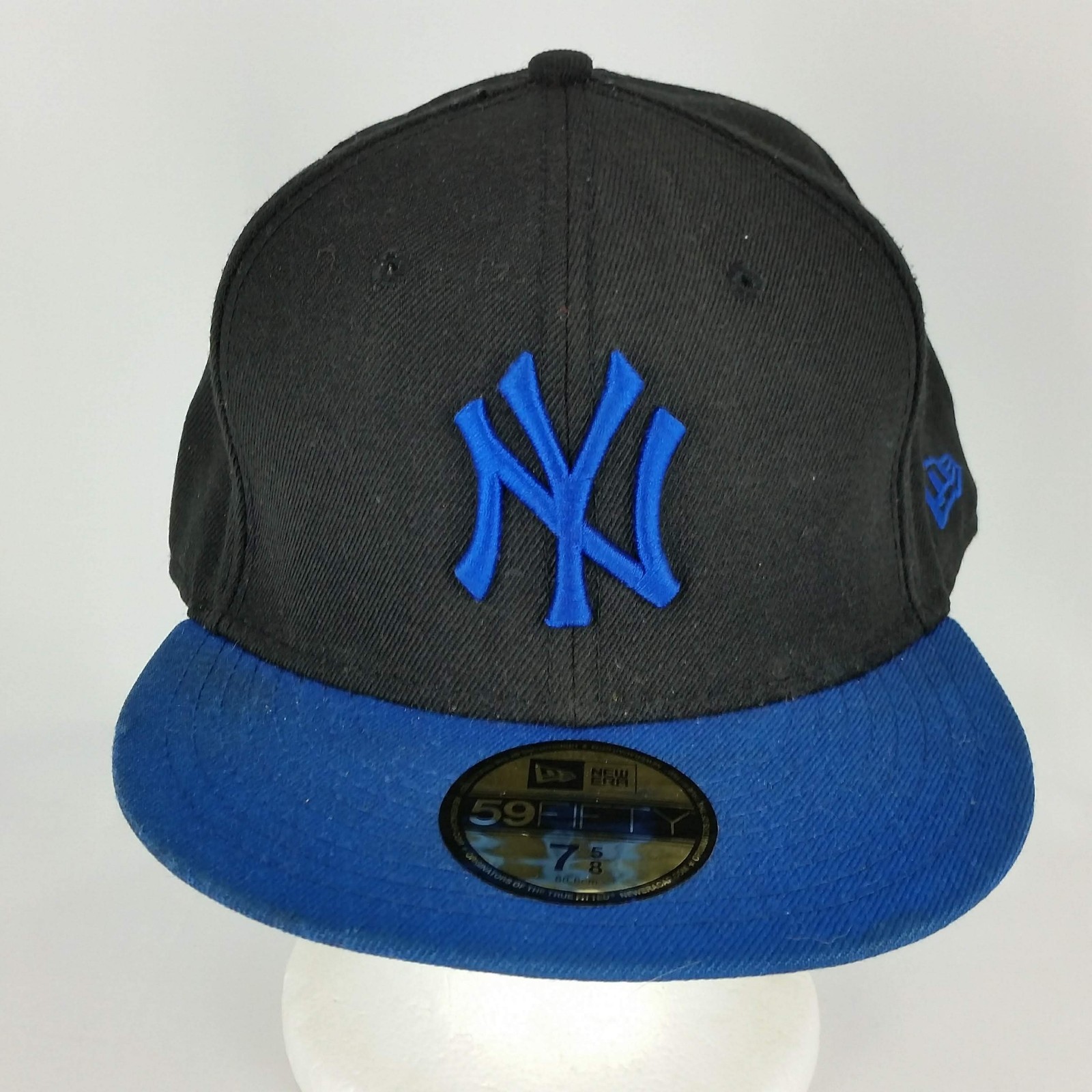 blue and black yankee hat