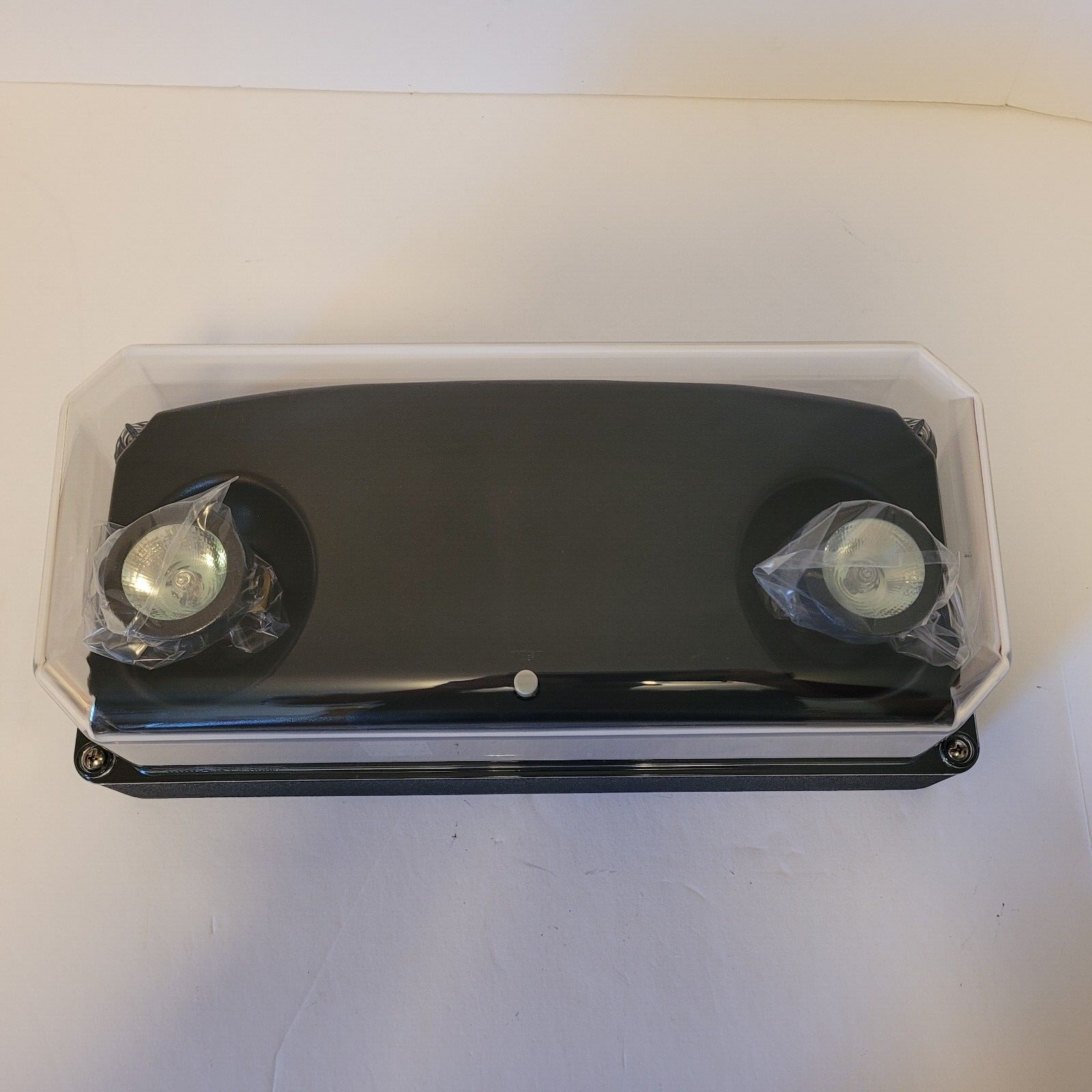 NOS COOPER UEL1BKSD Sure-Lites Exit/Emergency light IP66 Rated Nema 4X 120/277V