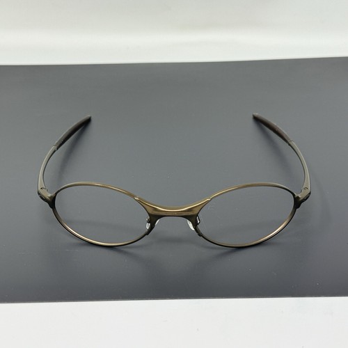 小物 OAKLEY e wire 90's original OAKLEY e-wire ['90s] Color: Gold (frame) x Brown (lens