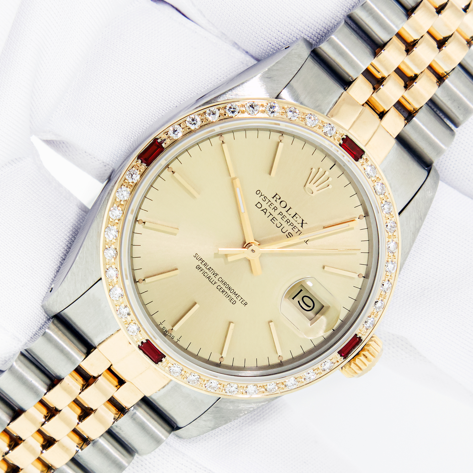 Rolex Mens Datejust Steel and 18K Gold Champagne Dial Diamond Ruby Bezel Watch