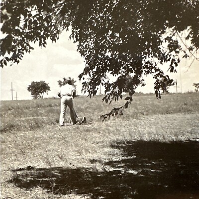 VINTAGE PHOTO Man Facing Away Mowing Lawn Back Camera ORIGINAL