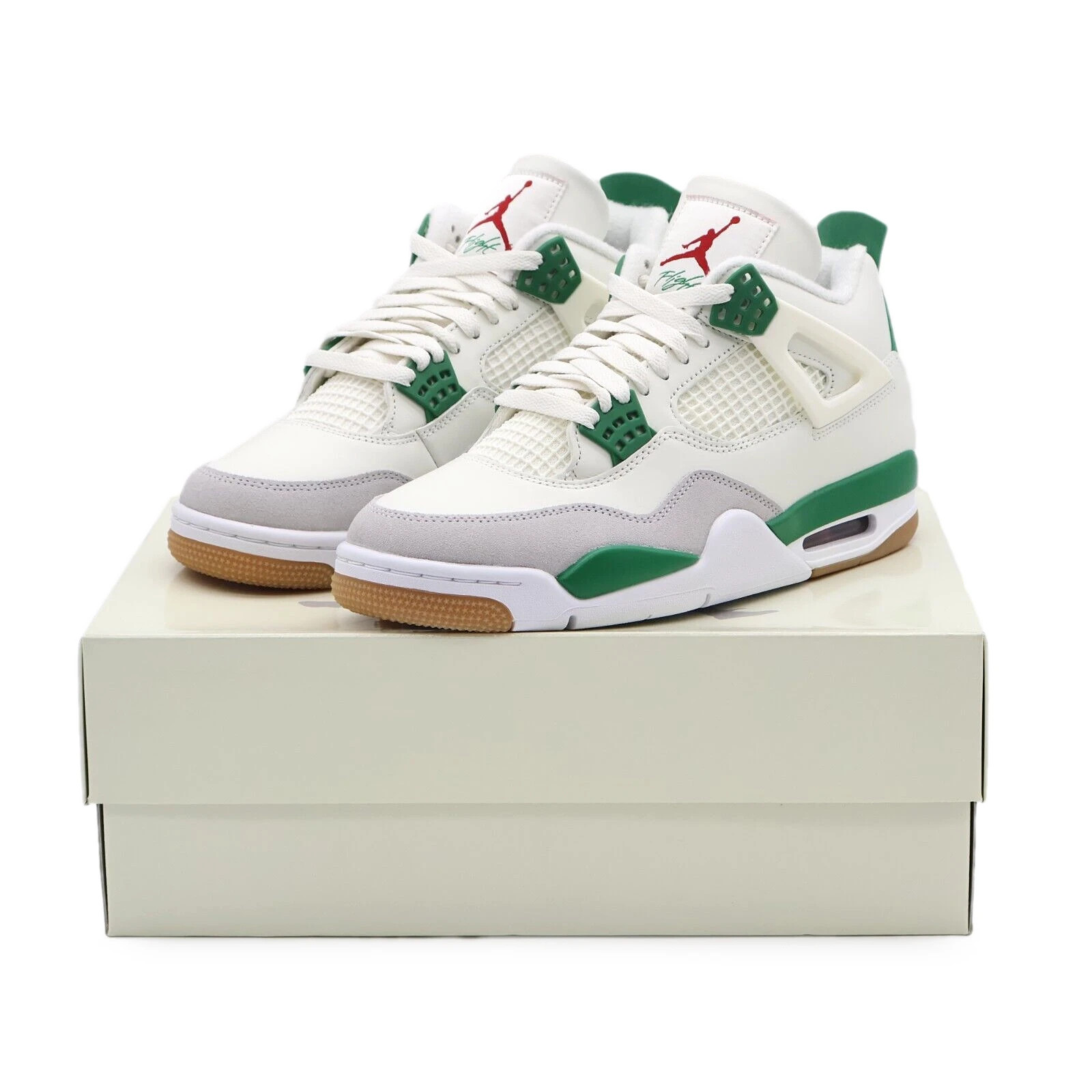 white and green jordan 4
