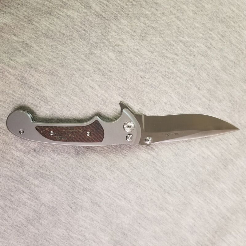 Brian Tighe custom button lock flipper knife