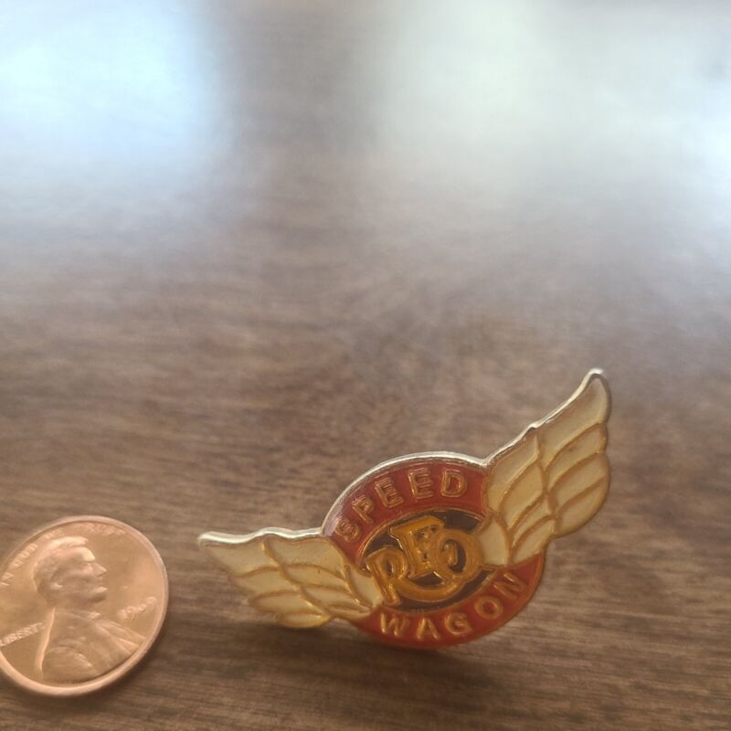 Nice Vintage REO Speedwagon Winged Metal Pin. Rare