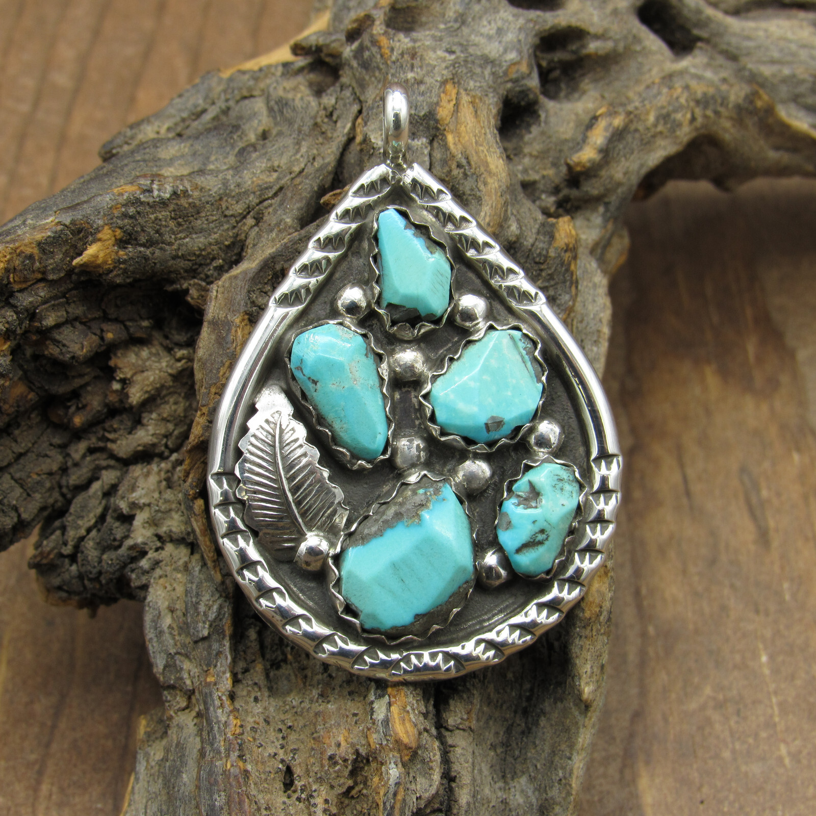 Sterling Silver and Turquoise Pendant by Zuni A. Penketewa+