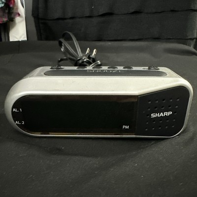 Sharp Digital Small Alarm Clock LED Display Battery Backup Snooze Model SPC100