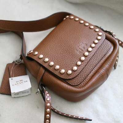NWT COACH Saddle Rivet Stud Pebbled Leather Dakotah Mini Crossbody Swing Bag NEW NWT COACH Saddle Rivet Stud Pebbled Leather Dakotah Mini Crossbody Swing Bag NEW