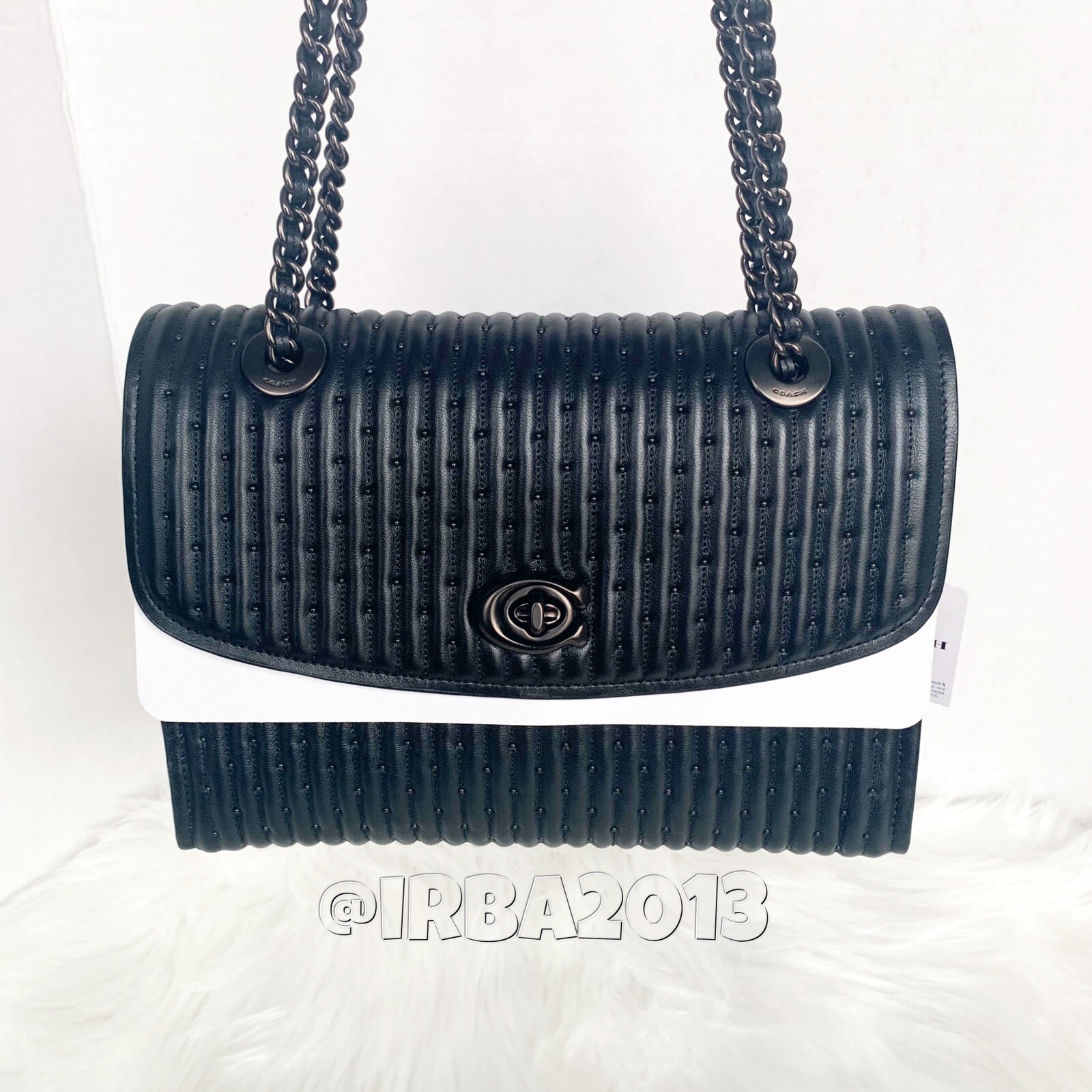 coach quilted parker