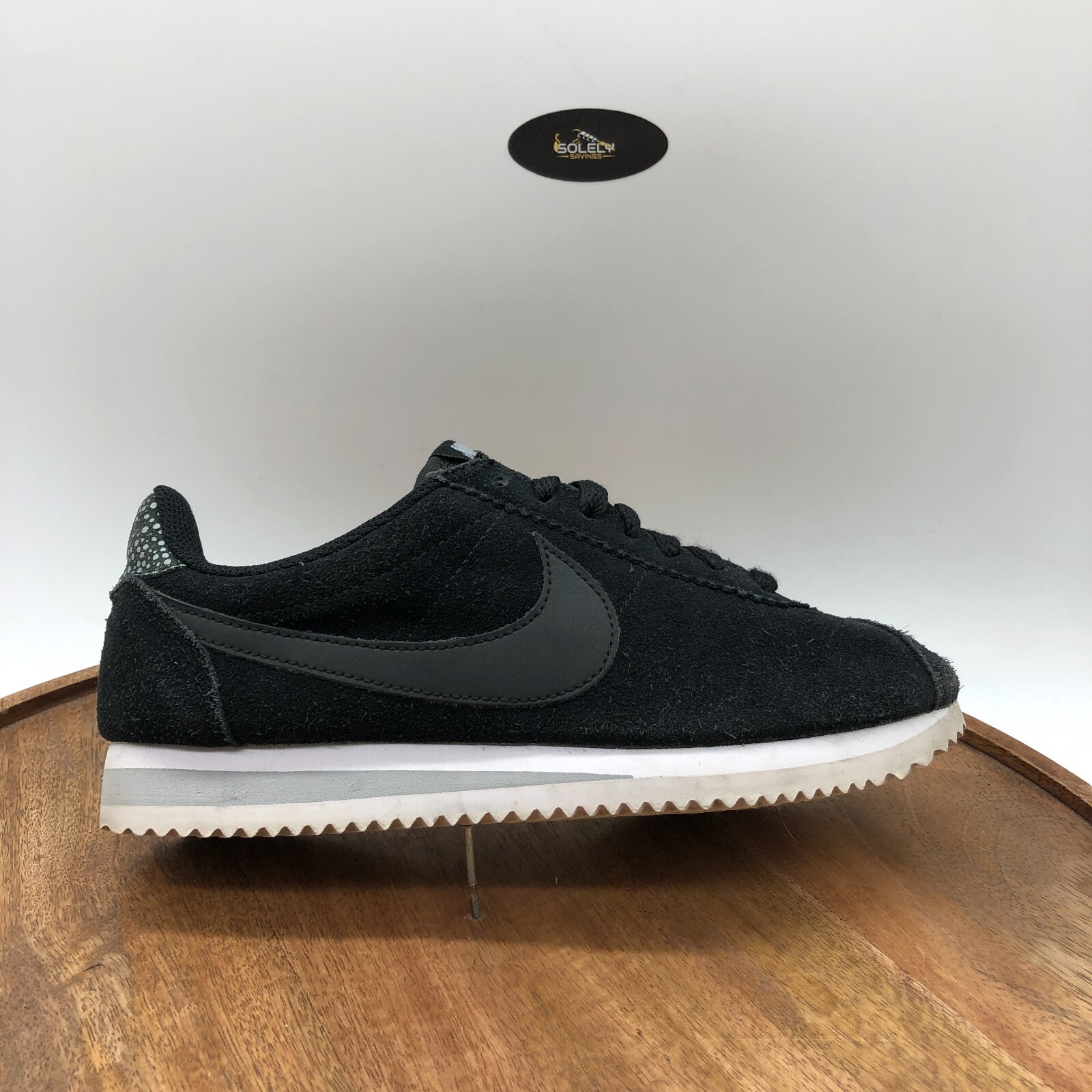 nike cortez black and white suede
