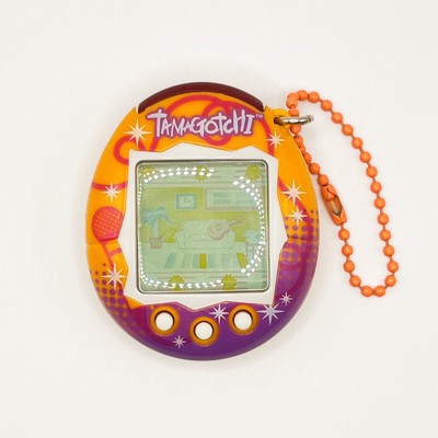 Tamagotchi V6 Music Star Orange With Pink/purple Graphics Tamagotchi V6 Music Star Orange With Pink/purple Graphics