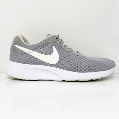 

Кроссовки для бега Nike Womens Tanjun 812655-010 серые, размер 7,5, Серый, Tanjun