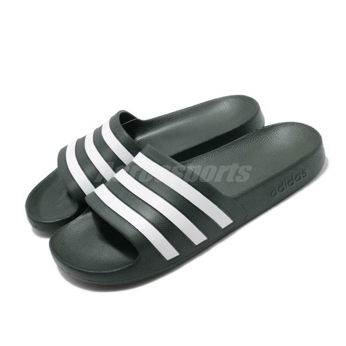 green and black adidas slides