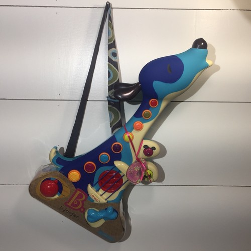 B. Woofer Toy Guitar Teaches Musical Discovery Rhythm Creativity Kids Baby Child