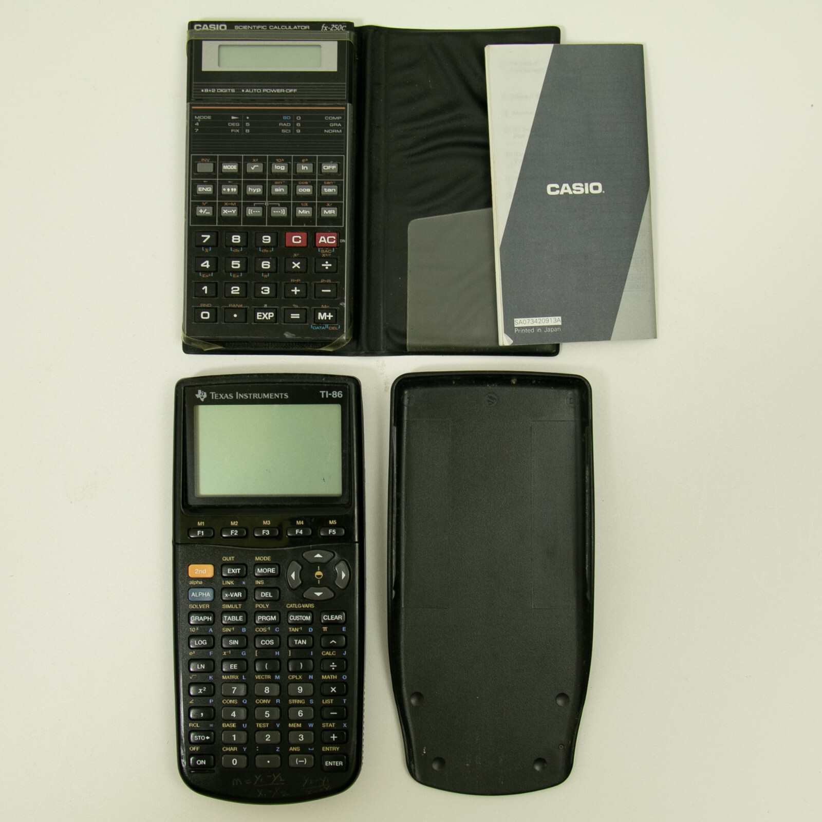 Casio fx 250c and Texas Instruments TI86 Calculators For Parts or