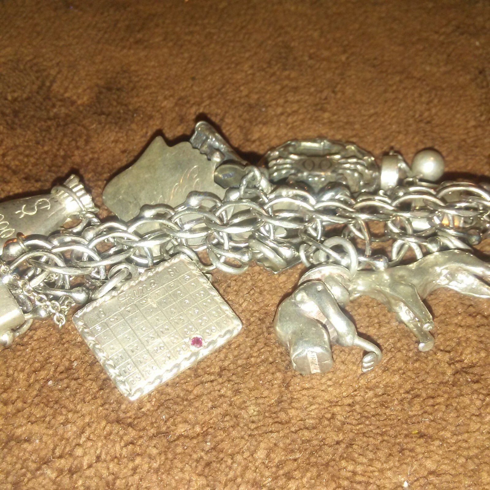 Vintage Sterling Silver Charm Bracelet with 24 Charms 86.6 grams 1960's