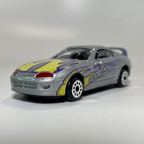 MotorMax (6012) Toyota Supra 1/64 Diecast Silver w/ Yellow