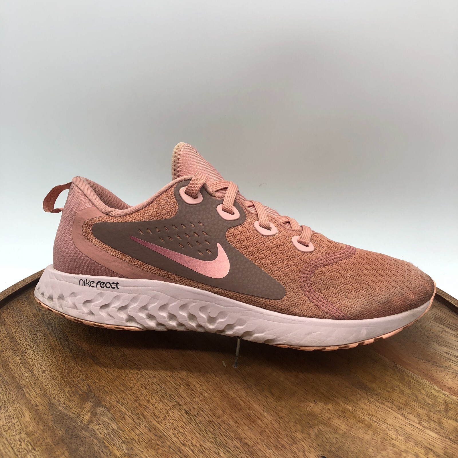 women's nike legend react rust pink