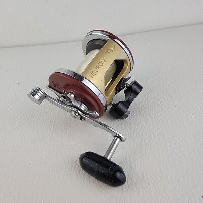 Vintage Penn Jigmaster No. 500 Fishing Reel W/ Gold Tiburon Frame