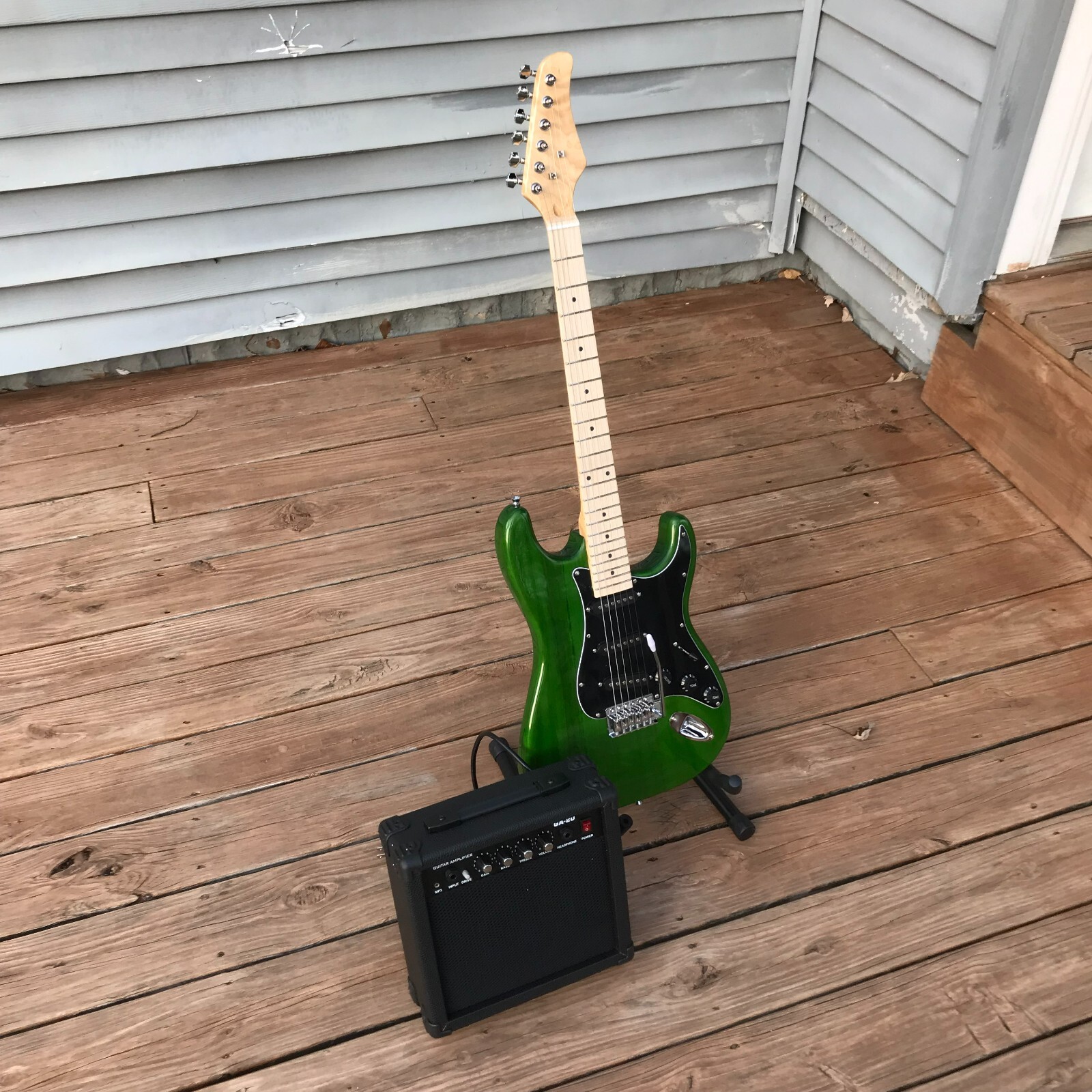 Full-Size Green Electric Guitar Starter Package with 20-Watt Amp and Accessories
