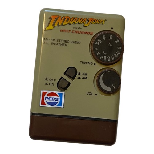 Vintage 1989 Indiana Jones And The Last Crusade AM/FM Handheld Transistor Radio Vintage 1989 Indiana Jones And The Last Crusade AM/FM Handheld Transistor Radio