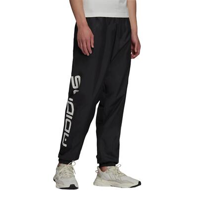 送料無料8,000円→6,980円 RETRO SPORTS PANTS adidas ORIGINALS MEN'S GRAPHIC SYMBOL TRACK PANTS JOGGERS