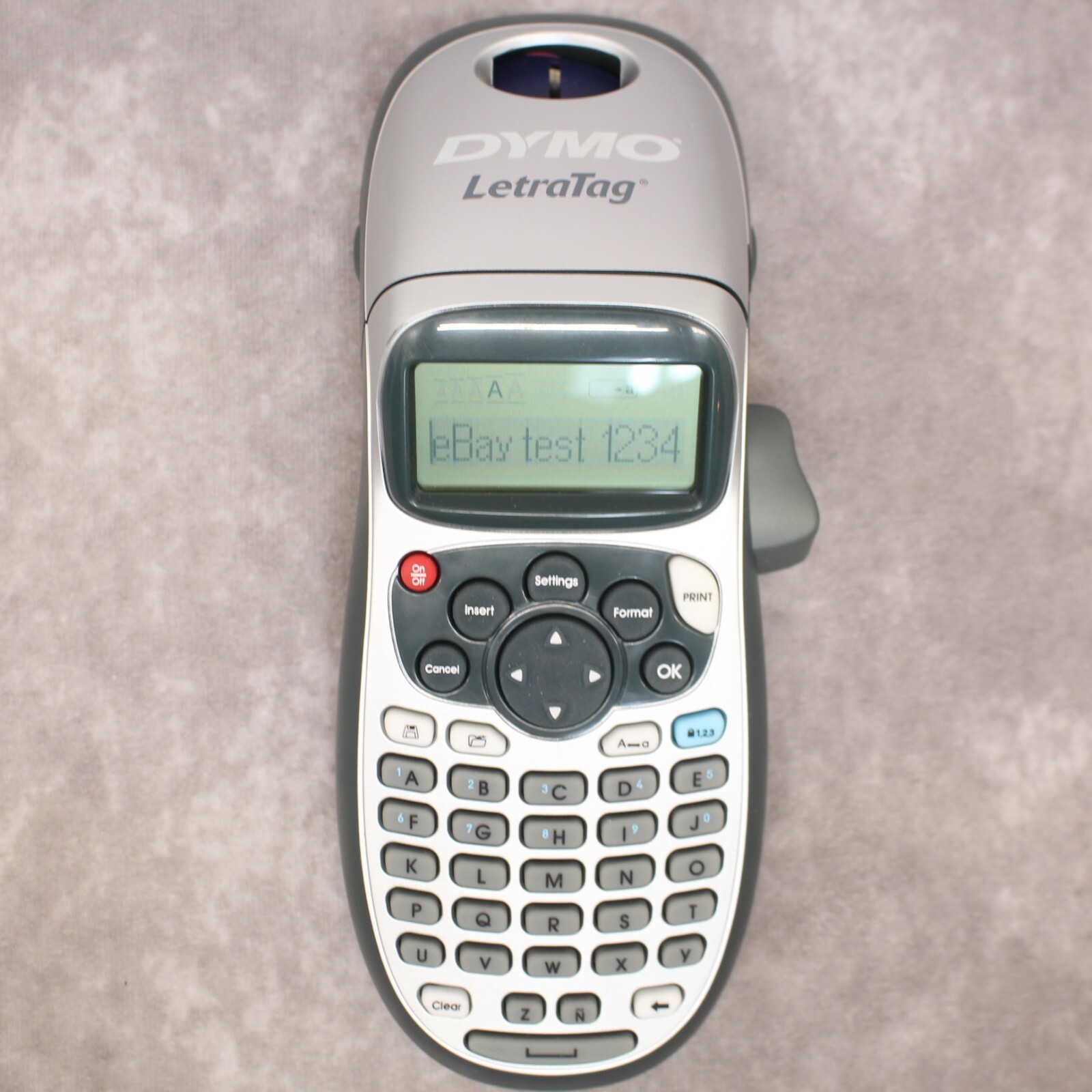 7 Off on Dymo Letratag LT100H Handheld Label Maker with printing tape