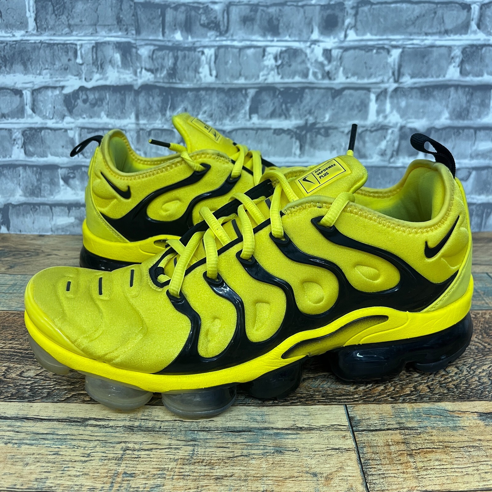 yellow and black vapormax plus
