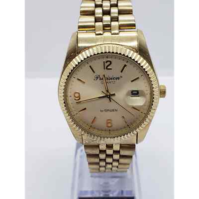 Precision Quartz by Gruen Men's watch. Gold face. GP5036, 098