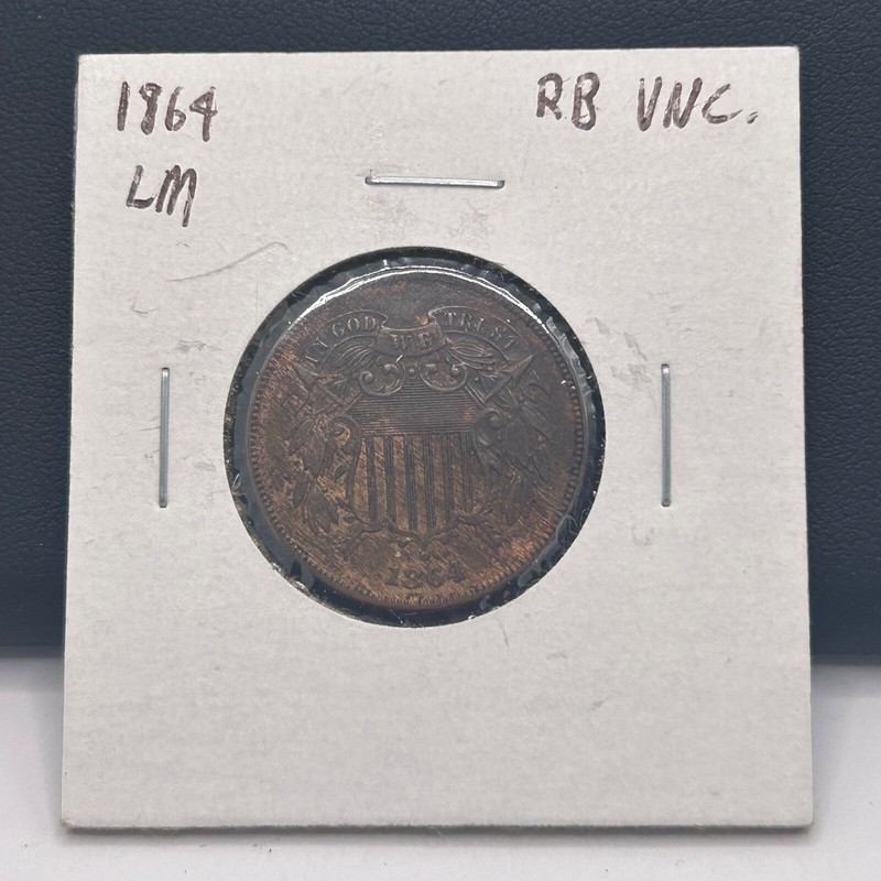 1864 LM Uncirculated 2 Cent Piece. RB Uncirculated. In Paper