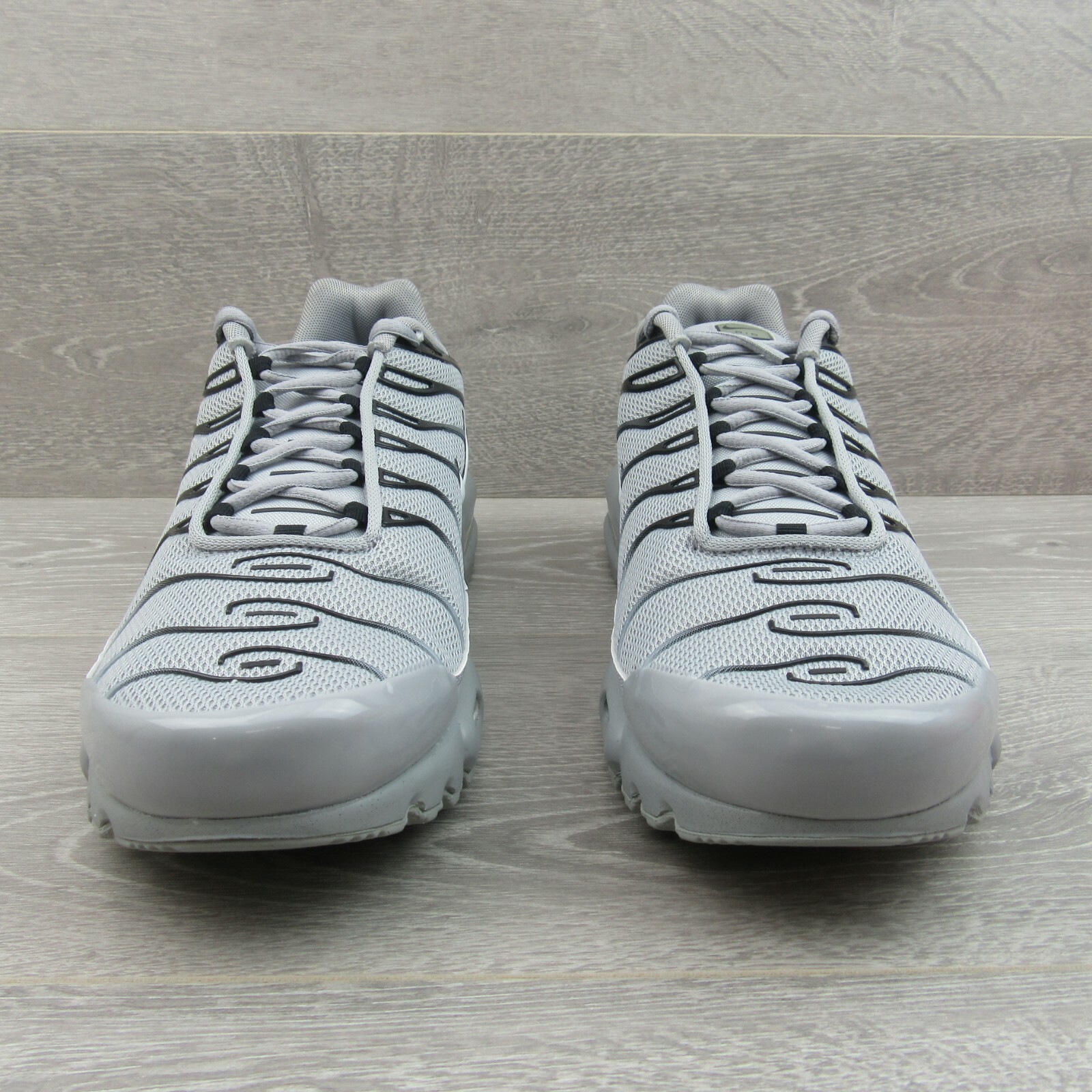 gray nike air max plus