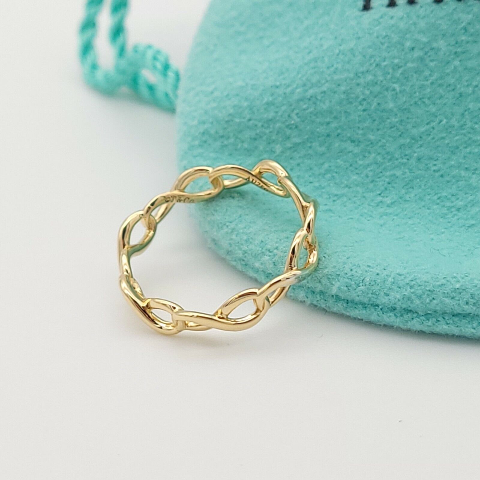 Tiffany & Co. AU750 18 Karat Yellow Gold Infinity Narrow Tiffany & Co. AU750 18 Karat Yellow Gold Infinity Narrow