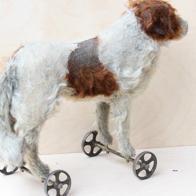 steiff dog on wheels