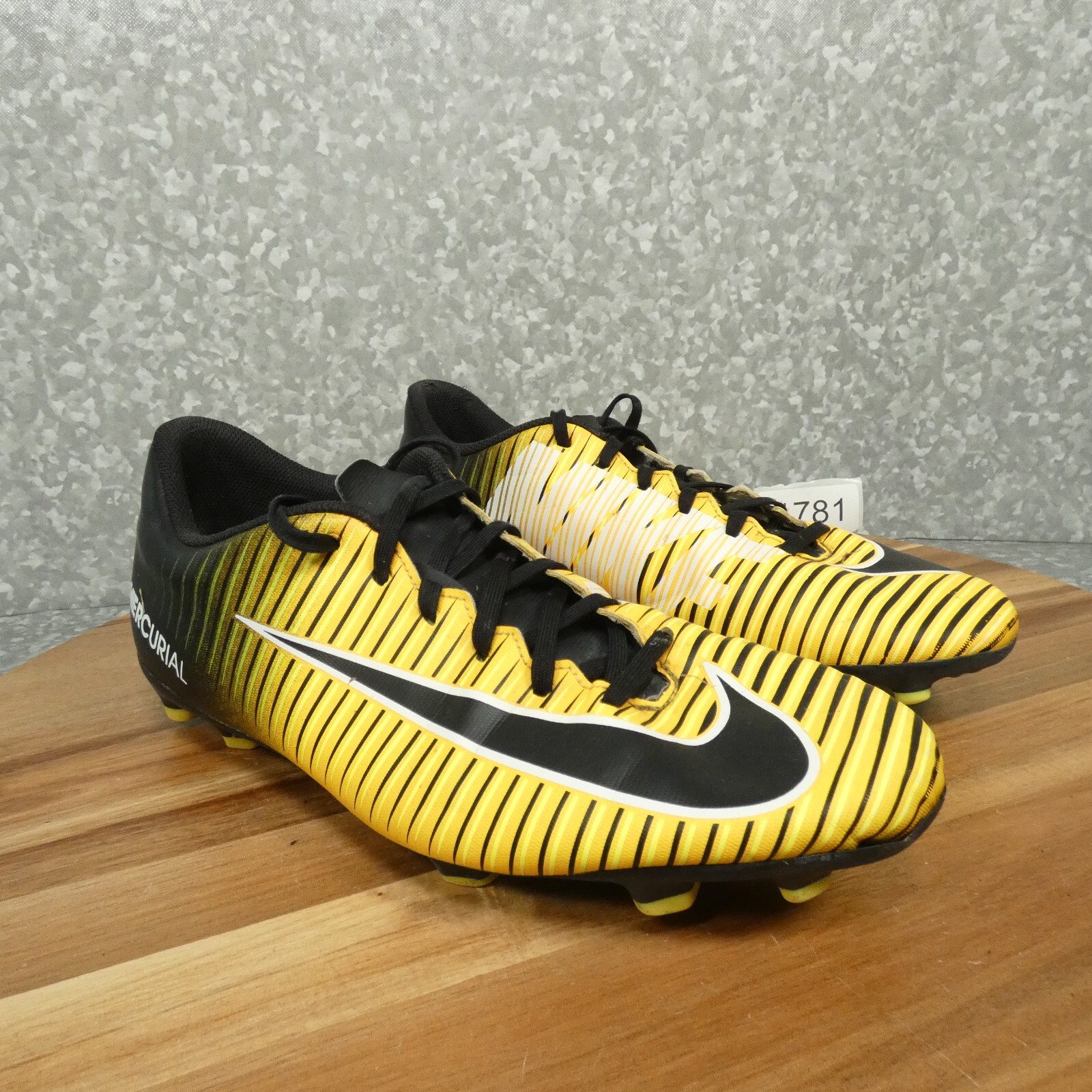 black and yellow nike soccer shoes