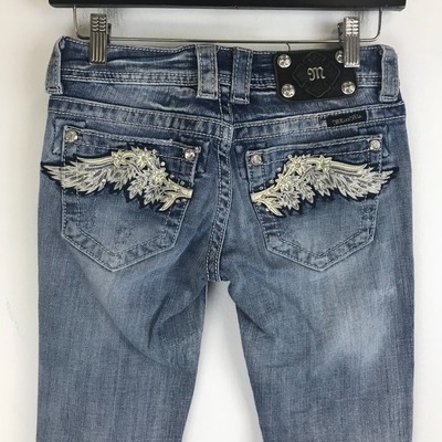 jeans with wings on back pockets