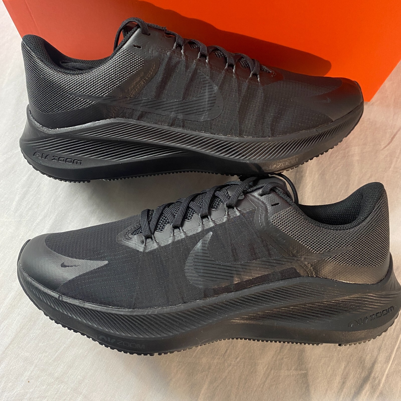 nike zoom pulse triple black