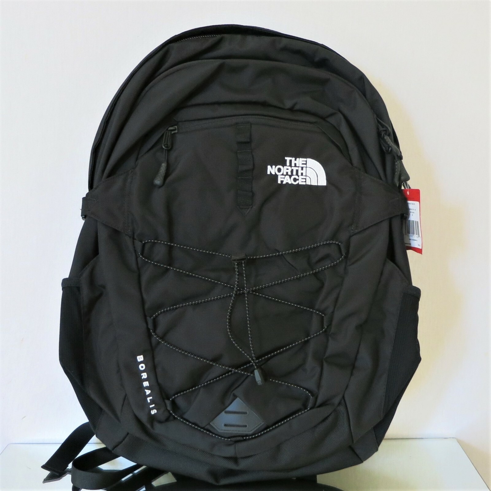 black and grey north face backpack