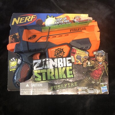 NERF ZOMBIE STRIKE FUSEFIRE LIGHT UP GLOW IN DARK BLASTER 5 DISC NEW