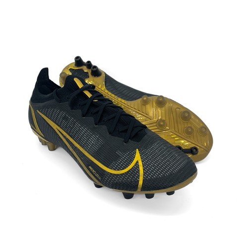 black and gold nike spikes