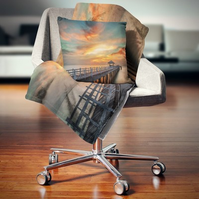Designart 'Colorful Sky and Long Wooden Pier' Pier Seascape Blue 71 in. x 59 in.