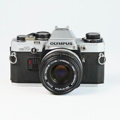 Olympus OM-10 35mm Film Camera w/ Zuiko 50mm f1.8 Lens TESTED