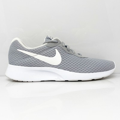 

Кроссовки для бега Nike Womens Tanjun 812655-010 серые, размер 9,5, Серый, Tanjun