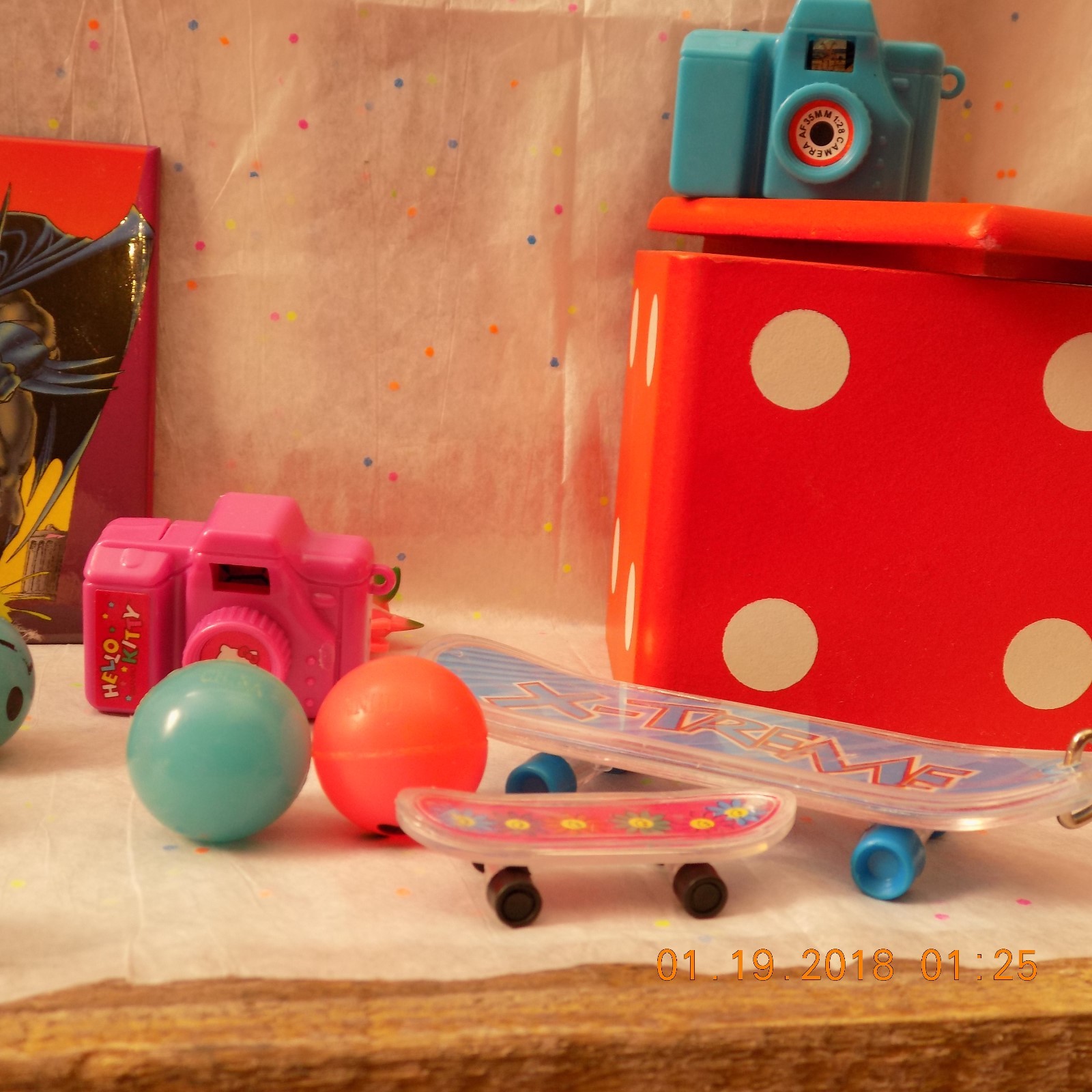 lot of mixed toys stress pig,hello kitty camera,happy face bounce balls,animal